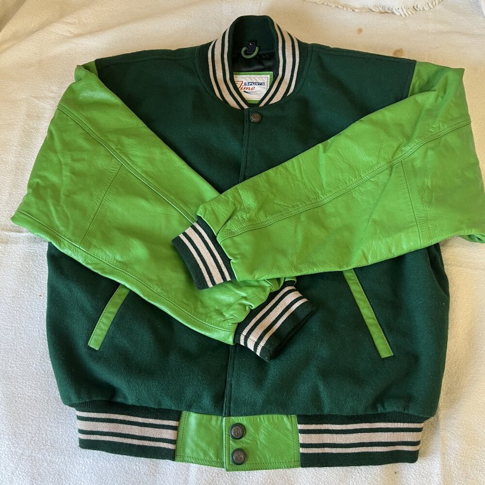 Versity Jacket , Brand new, Leather sleeves and Woolen body.